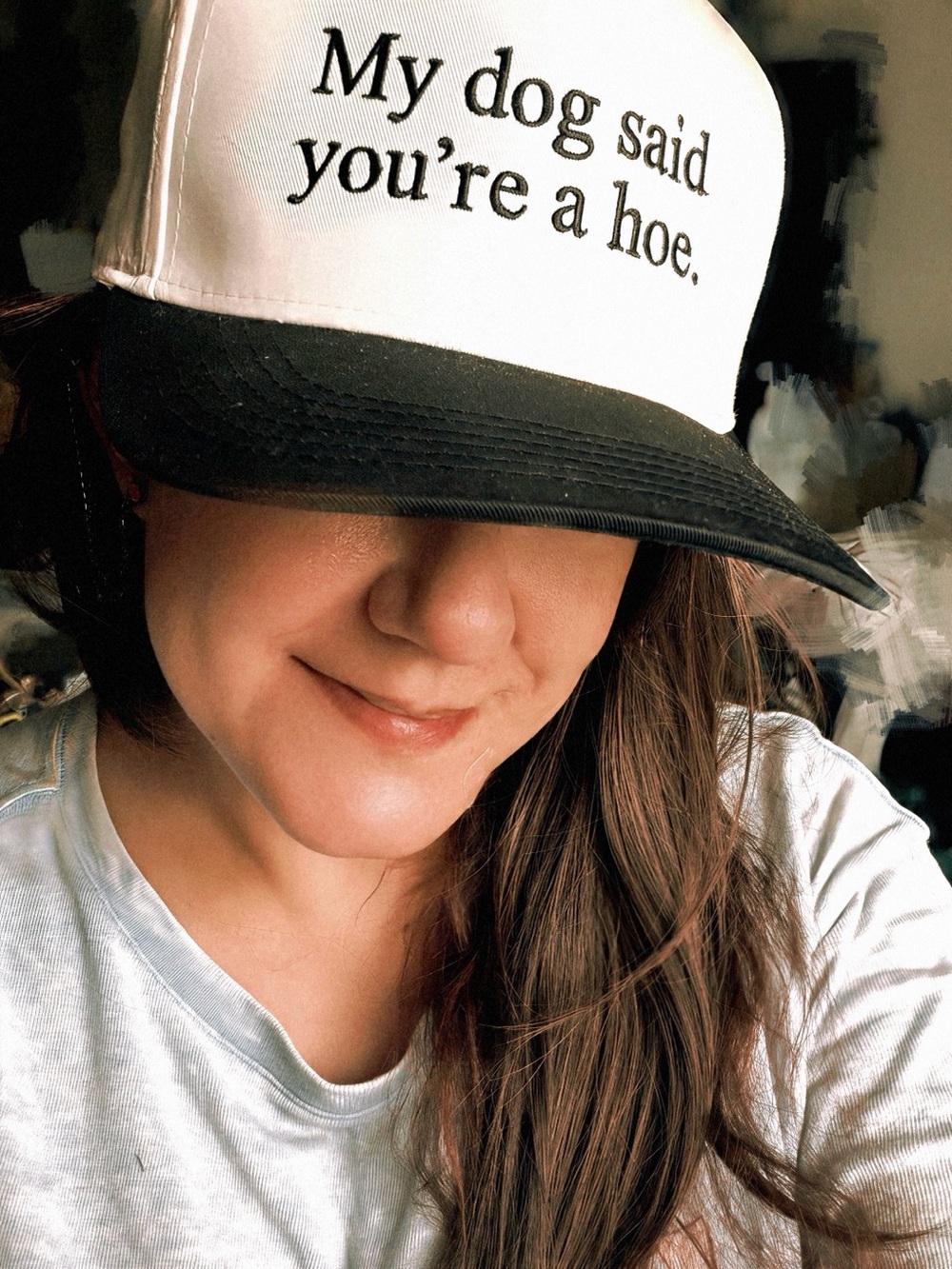 Cream and black ‘my dog said you’re a h*e’ trucker hat